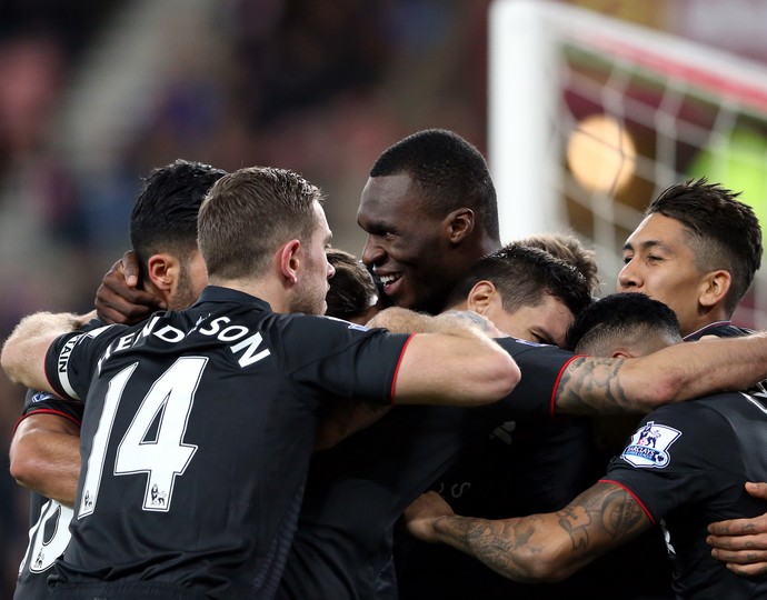 Benteke comemora gol da vitória do Liverpool sobre o Sunderland, fora de casa (Foto: AP Photo/Scott Heppell)