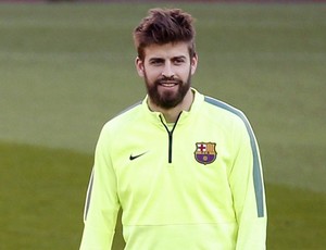 Messi e Piqué no treino do Barcelona (Foto: EFE)