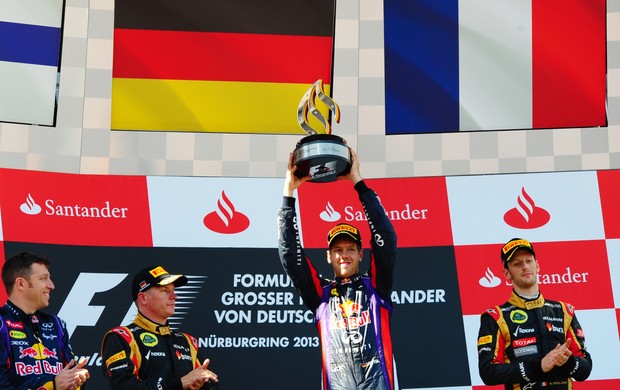 Sebastian Vettel, Kimi Raikkonen e Romain Grosjean no pódio do GP da Alemanha (Foto: AFP)