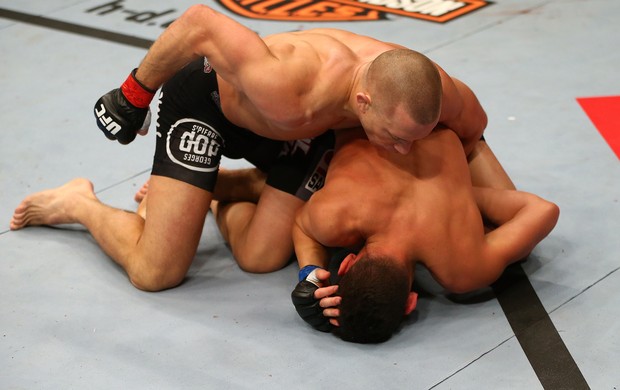 UFC 158 Georges St-Pierre e Nick Diaz (Foto: Agência Getty Images)