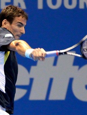 Tommy Robredo tênis contra Bellucci desafio internacional (Foto: Marcello Zambrana / Inovafoto)