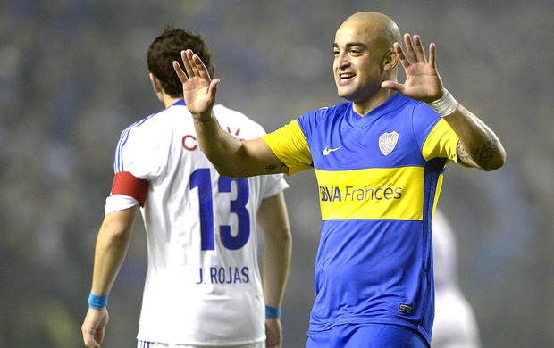 Santiago Silva comemora gol do Boca Juniors contra a U. de Chile (Foto: AFP)