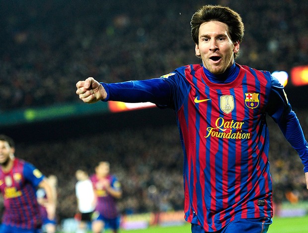 Messi comemora gol do Barcelona contra o Valencia (Foto: AP)