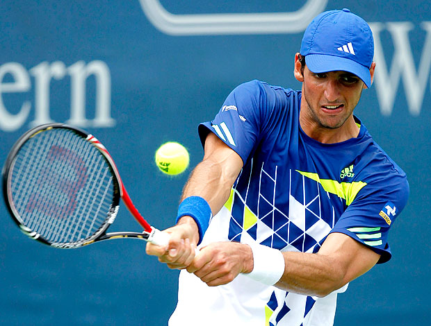 Thomaz Bellucci na partida contra Fernado Verdasco (Foto: Reuters)